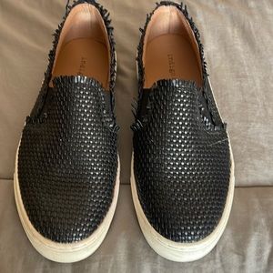 Ladies black slip on sneakers